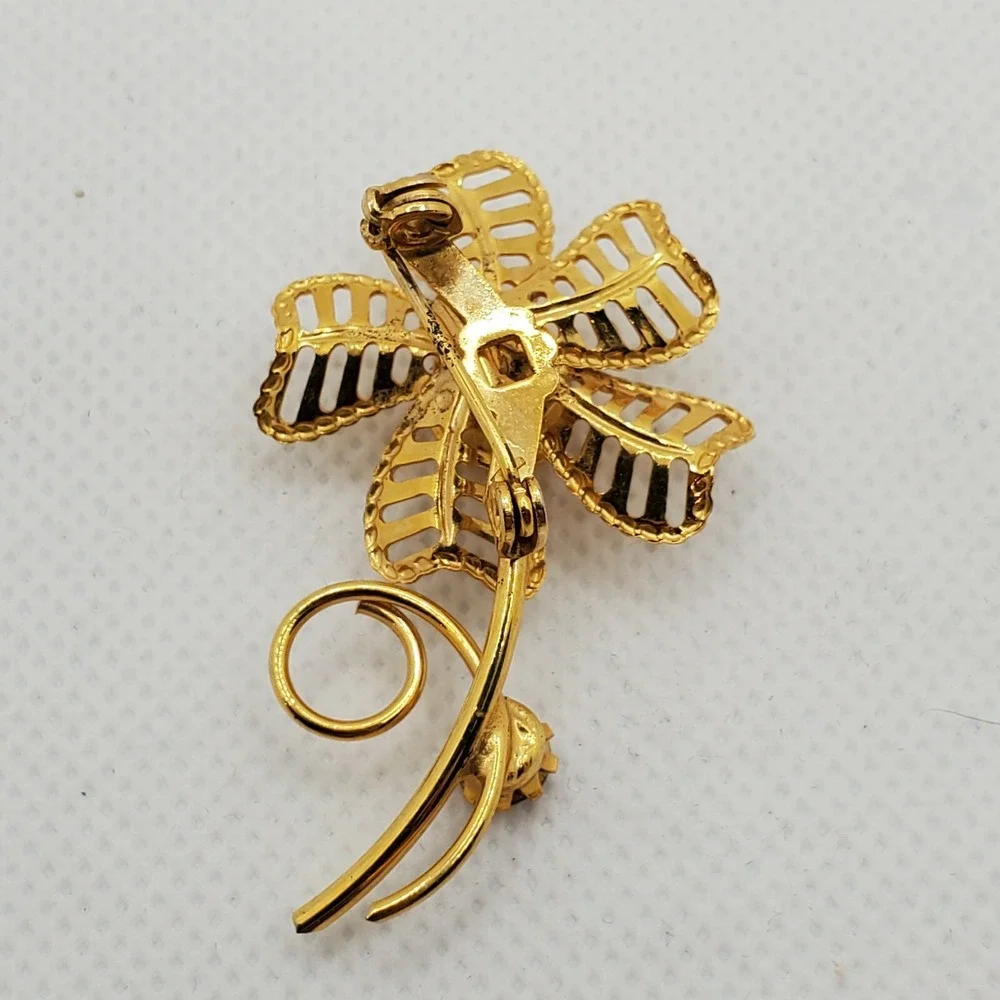 Vintage Open work Gold Tone Metal Flower w/Topaz color Rhinestones Brooch Pin